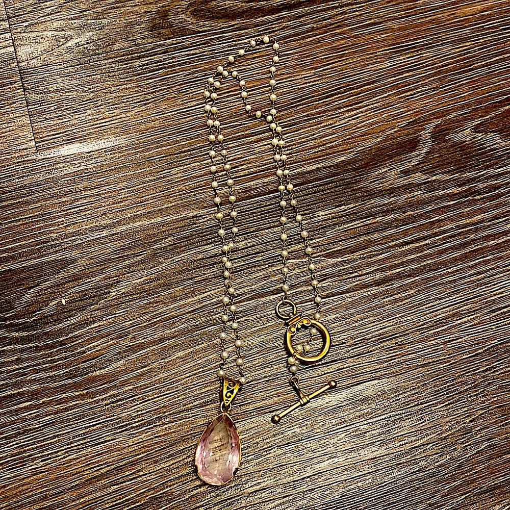 Fun, dramatic , long pearl and crystal necklace. Very Boho